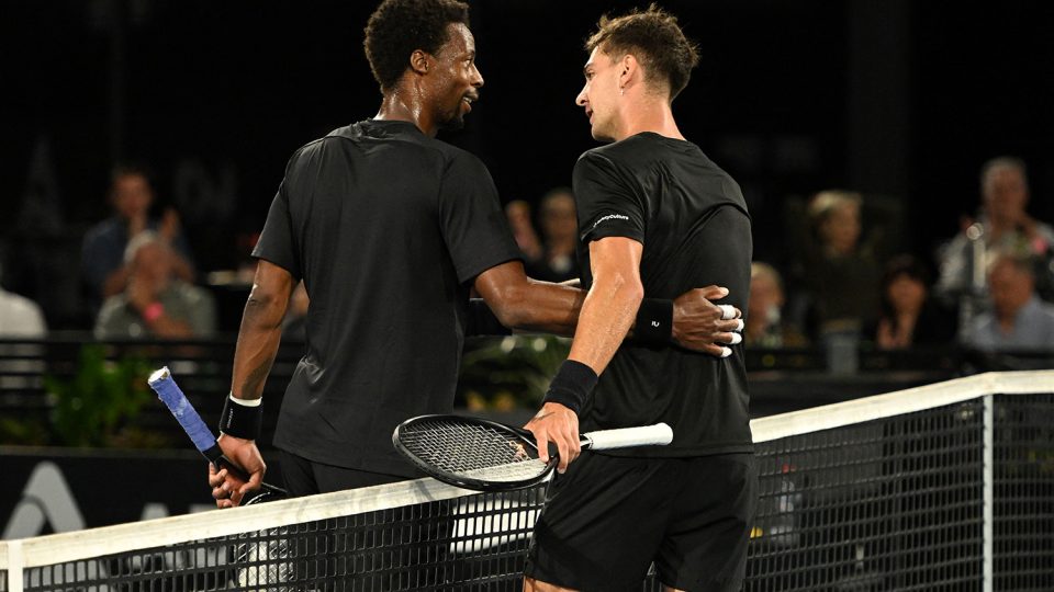 Gael Monfils (L) defeated Thanasi Kokkinakis in the semifinals of the Adelaide International